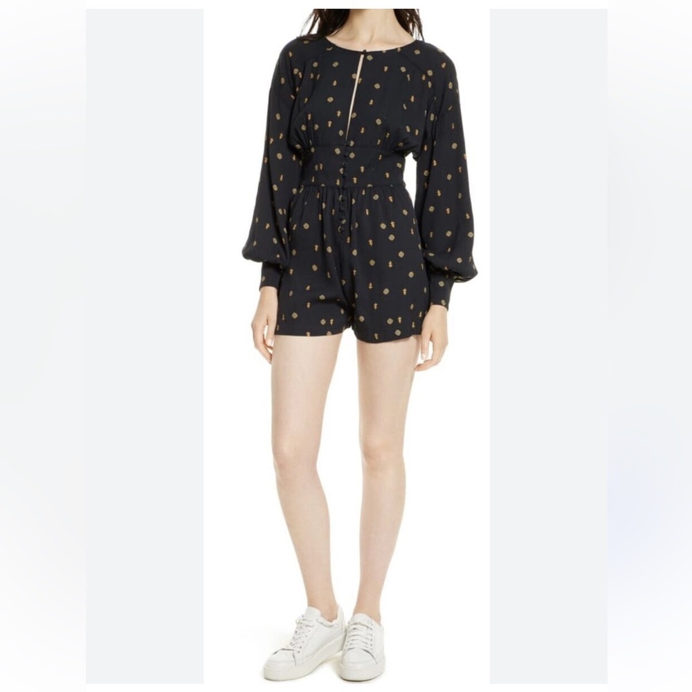 New! Free People large Love grows black printed long sleeve Keyhole romper.